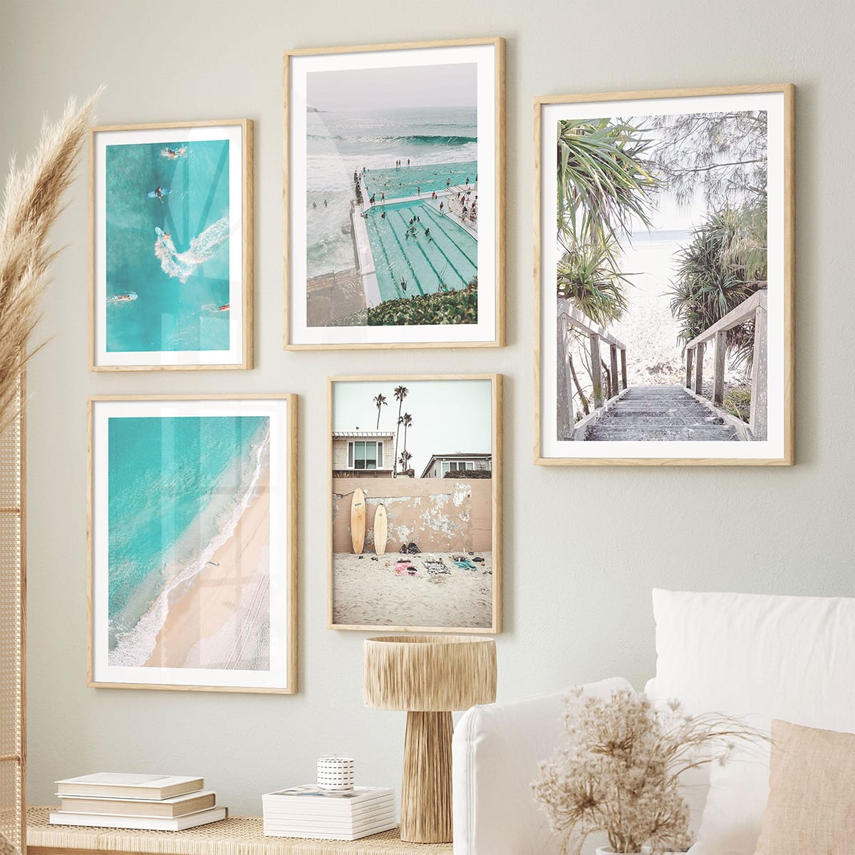wall display of framed coastal and beach art prints